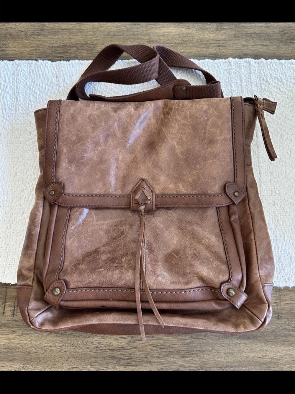 The Sak Distressed Brown Leather Flap Backpack